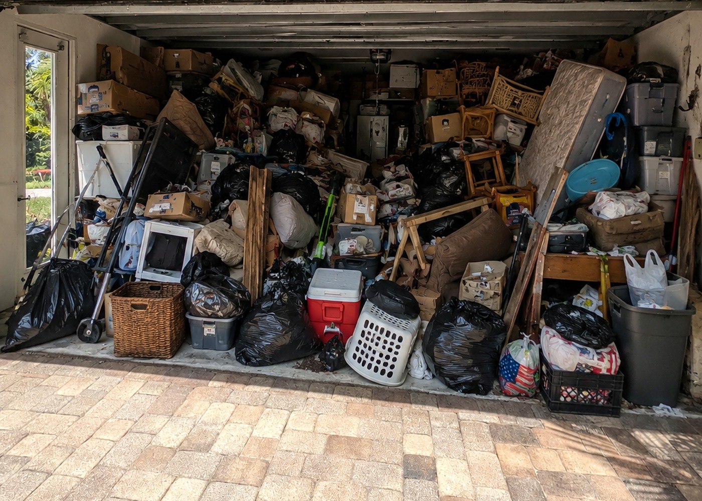 St. Petersburg garage packed floor to ceiling with boxes, bags and furniture